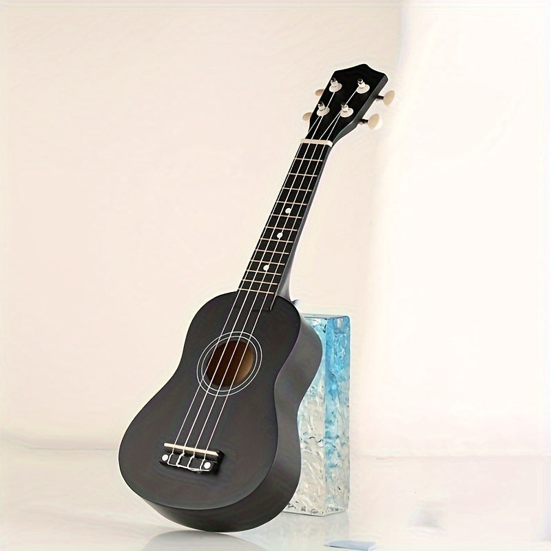 21-inch high pitch ukulele for adults and teens, made of solid basswood with four strings, in black color.