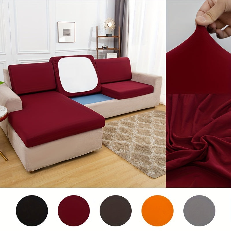 Stretch sofa seat cover to protect living room cushion.