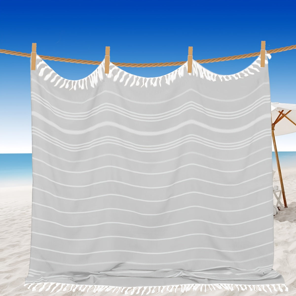 Large Turkish beach towel made of 100% cotton with modern striped woven pattern and space theme. Low linting, quick-dry, sand-free, and compact design for men and women. Perfect gift for outdoor use.