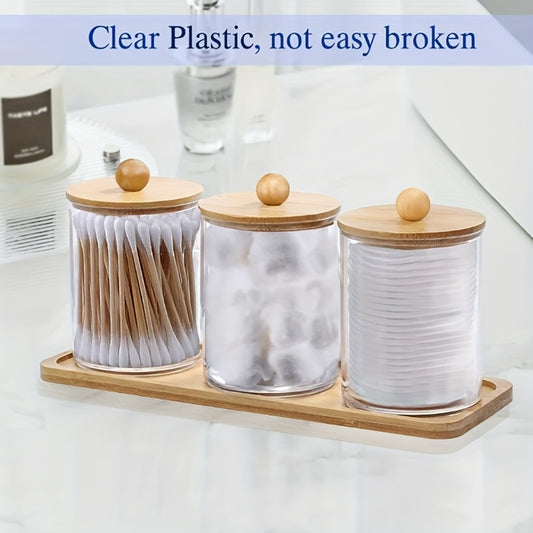 Qtip holder with bamboo lids for bathroom storage of swabs, balls, pads, and floss.