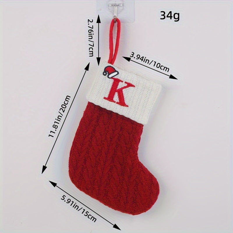 Knitted letter Christmas socks for home tree ornaments; red socks in gift bag for festive attire.