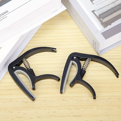 High-quality ABS guitar capo for acoustic, electric guitars and more - durable and easy to clip on.