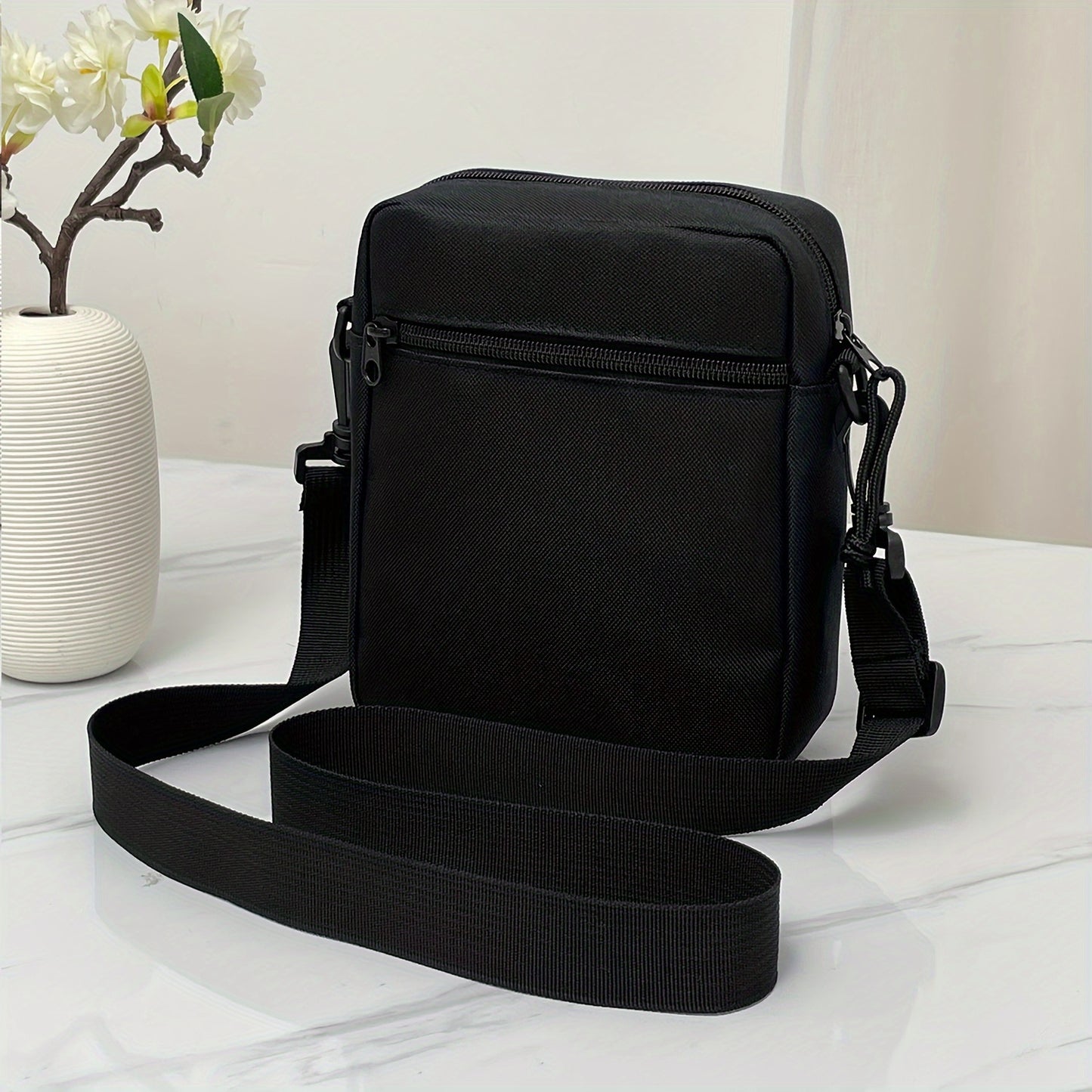 Fashionable and simple men's shoulder bag made of nylon, suitable for casual wear.