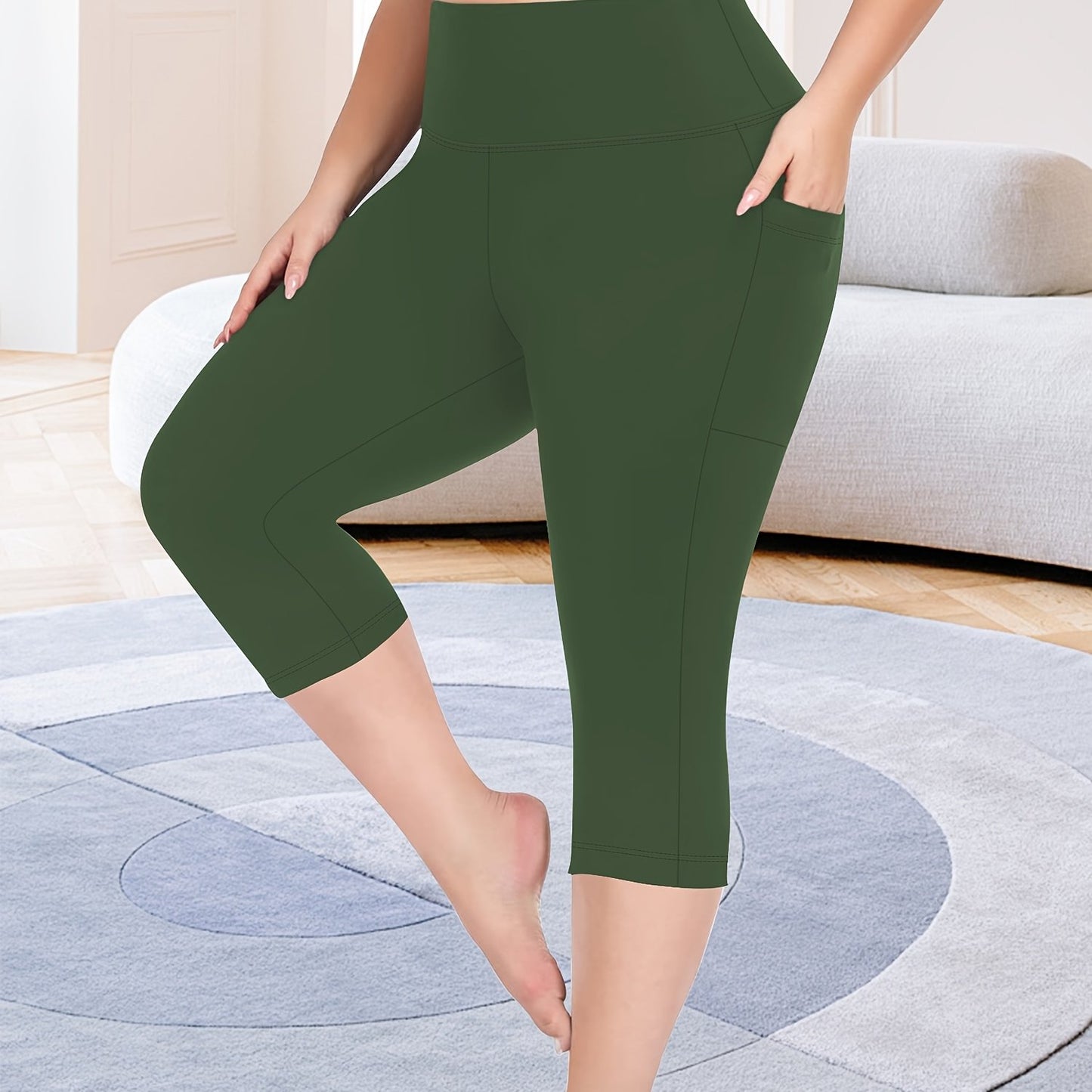 High-waisted capri leggings for plus-size women with side phone pockets, ideal for workouts.