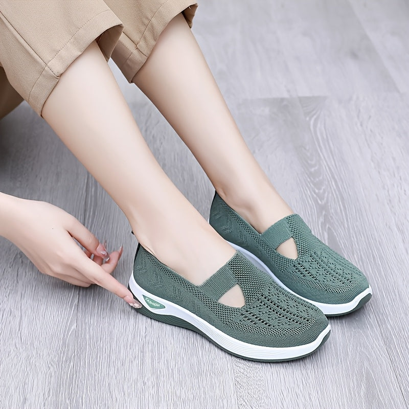 Breathable mesh slip-on sneakers for women with a comfortable PVC sole and loose fit.