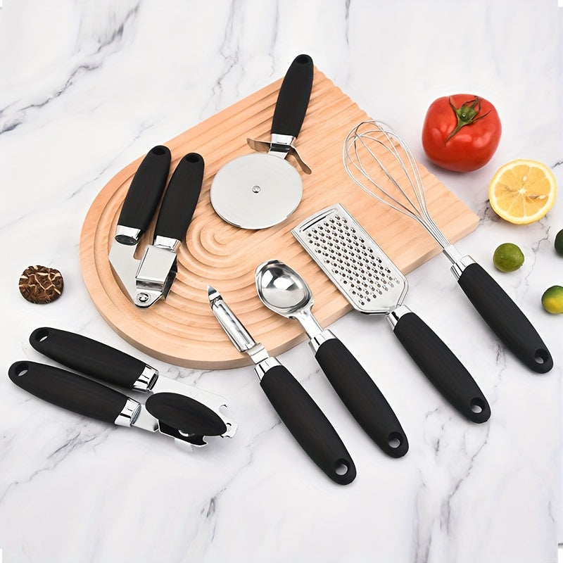 Set of 7 stainless steel kitchen utensils with comfort grip handles. Includes whisk, grater, peeler, ice cream scoop, can opener, garlic press, and pizza cutter. Ideal for various cooking tasks.