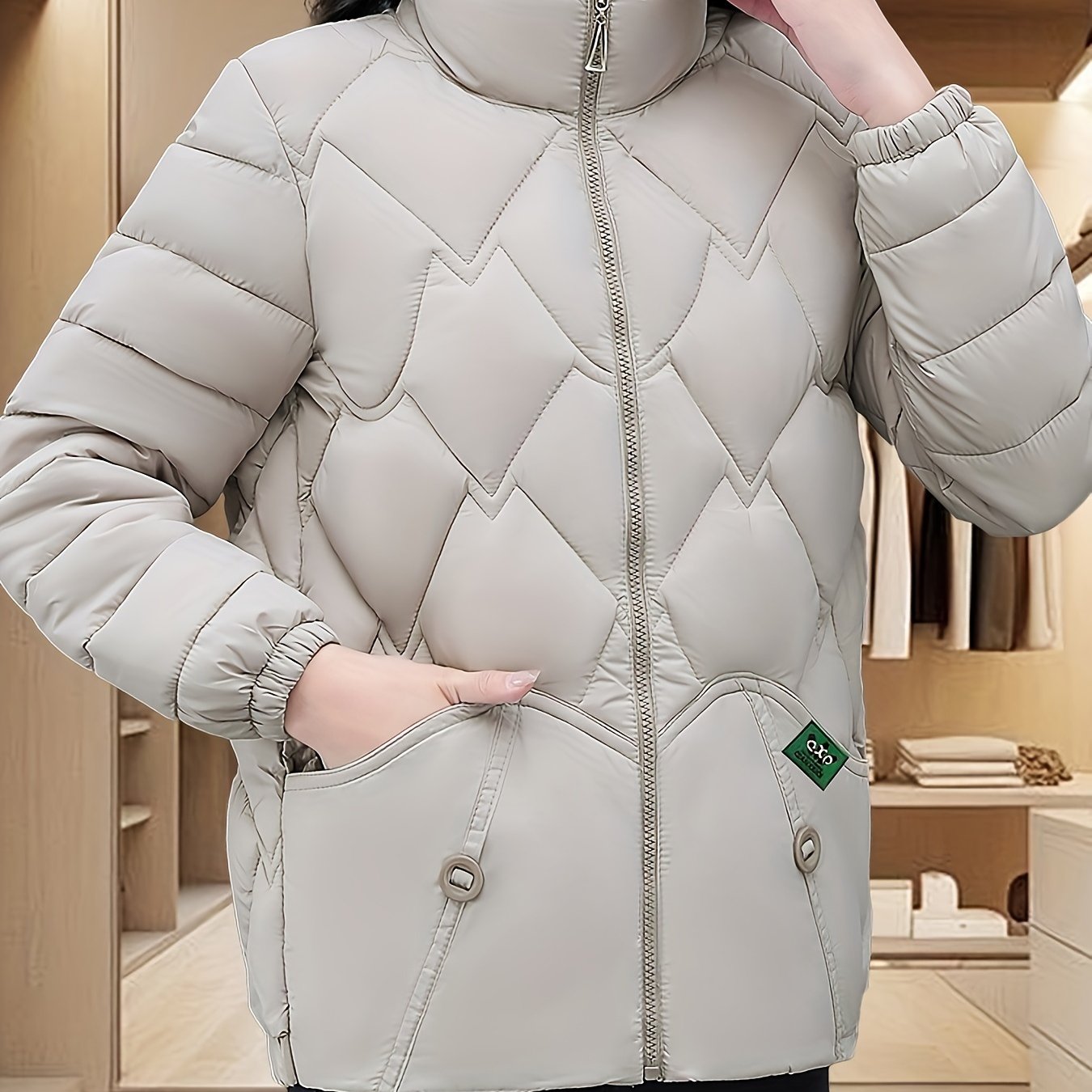 Embroidered quilted jacket for middle-aged moms with pleated hem and thick insulation for warmth.