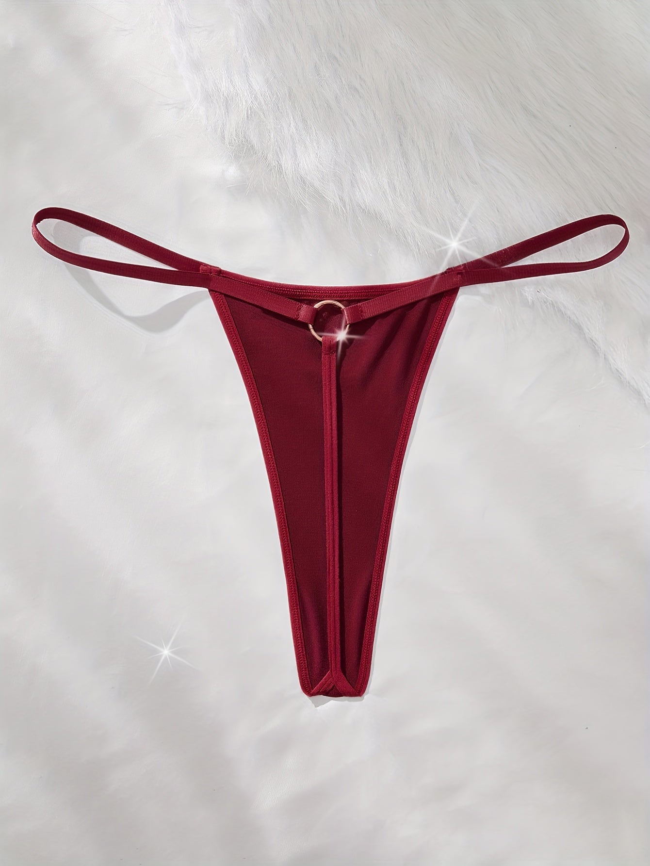 Low waist thong with metal ring.