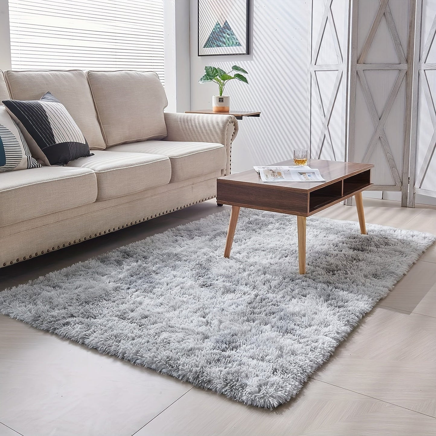 Luxurious soft plush shag area rug perfect for the living room, fluffy shaggy floor carpet ideal for the bedroom. This home decor piece adds warmth and style to any space. Non-slip and machine washable, it's perfect for the living room, bedroom, game