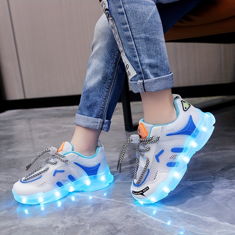 Children's LED light-up sneakers with breathable mesh, non-slip soft sole, and trendy street style for nighttime visibility, ideal for outdoor play and sports in white/blue/orange designs.