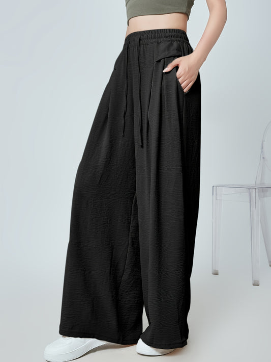 Stylish lounge bottoms with elastic drawstring, pleated detail, and wide leg fit for women's loungewear.