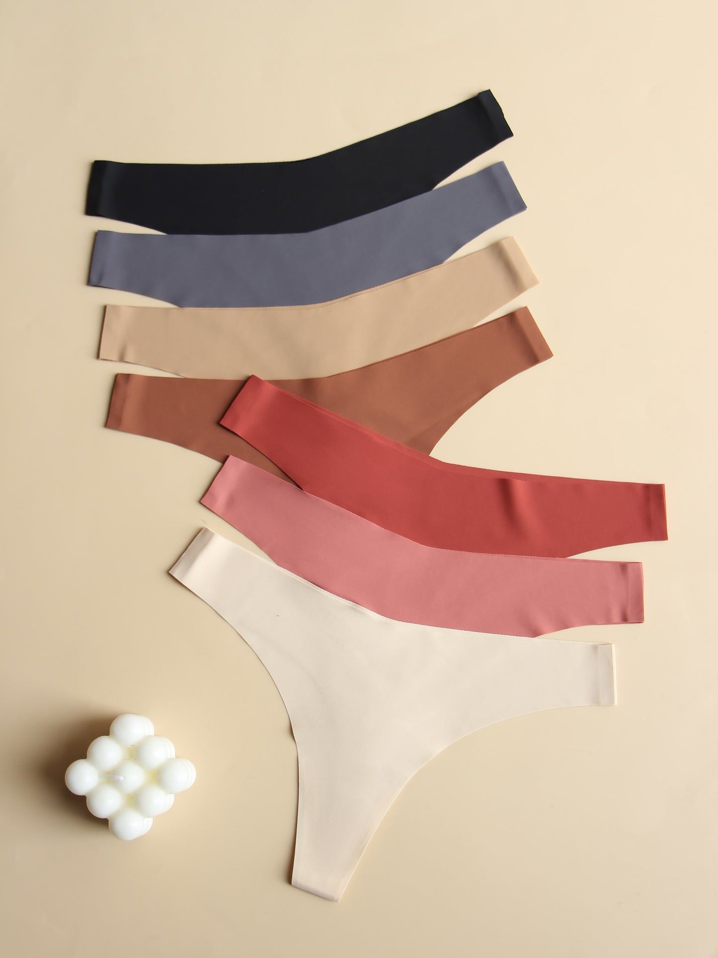 Innovative, comfortable 7-piece plain v-style women's underwear set with breathable, soft fabric and no visible marks.