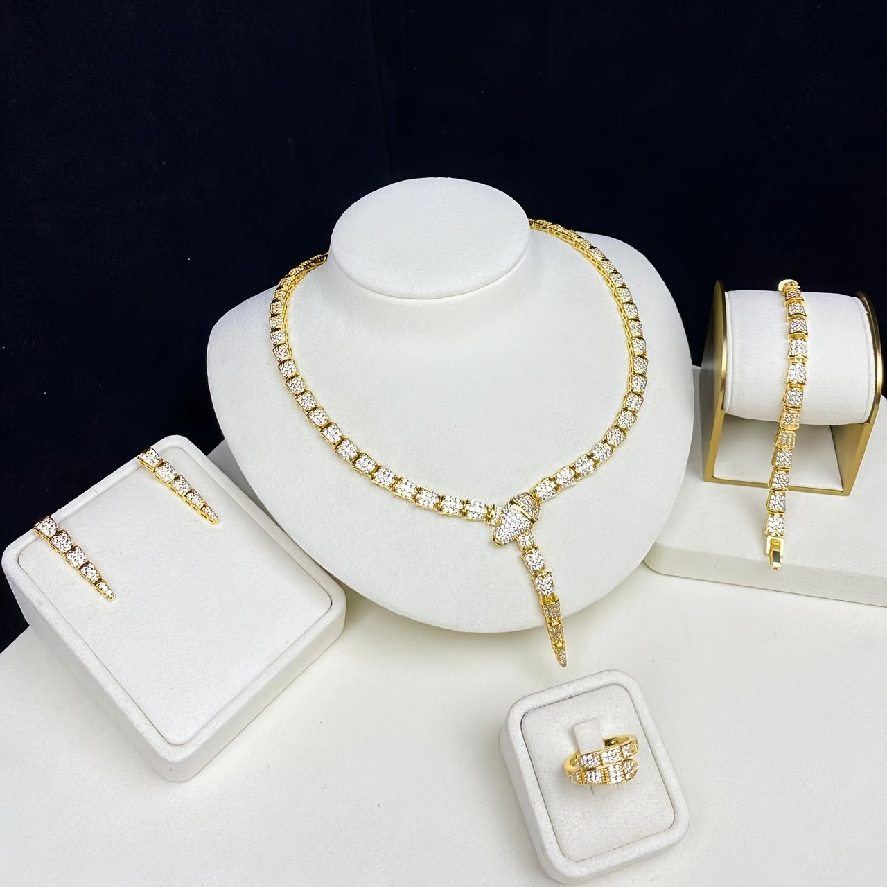 Stunning 18K Gold Plated Copper Jewelry Set featuring AAA Zirconia Stones, featuring a Seductive Snake Design Necklace and Ring. Suitable for both Everyday Wear and Special Occasions, an Ideal Gift for Women, especially during Ramadan.