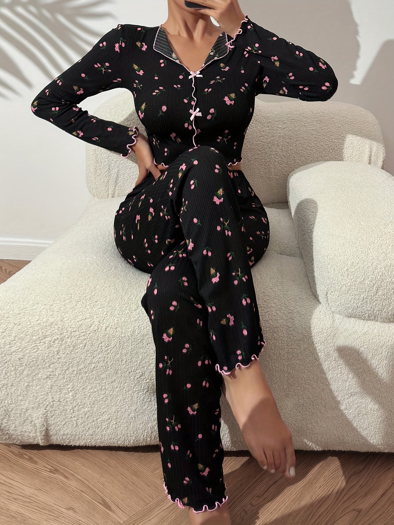 Floral print pajama set with bow detail, long sleeve top and ribbed pants in soft polyester blend - ideal for autumn nights