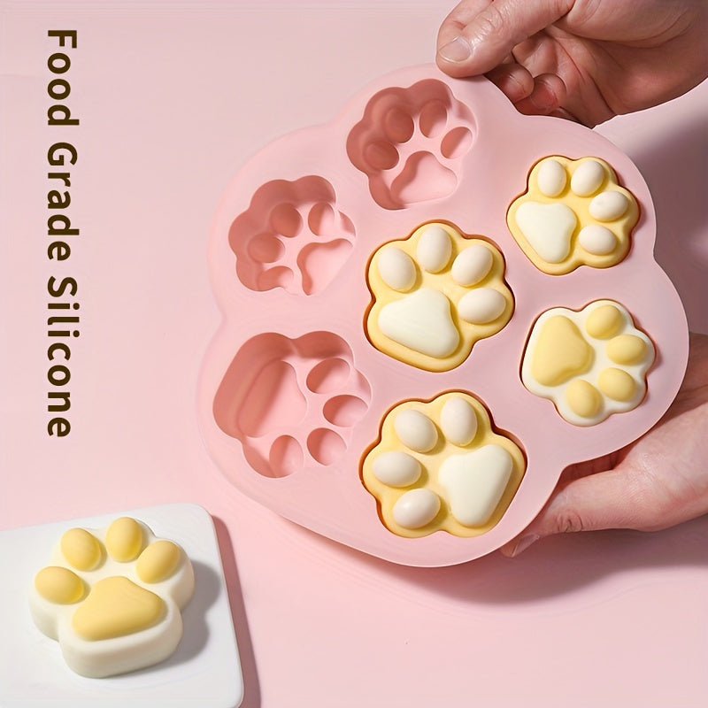 Pink Silicone Paw Print Treat Mold with 7 cavities - non-stick, food-grade silicone for baking a variety of treats including dog treats, cookies, candy, chocolate, and jelly. Perfect for baking with silicone molds.