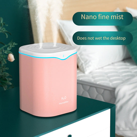 2000ml capacity humidifier with dual nozzles, USB powered, 2 spray modes, perfect for bedroom & office desk. Easy plug-in use, modern design, LED indicator light.