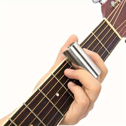 1 Guitar slide stick and finger ring made of glass or stainless steel, with finger sleeve made of clear glass or bakelite.