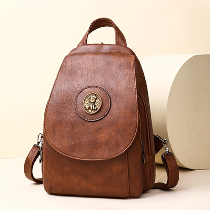 Women's retro-style synthetic leather backpack with adjustable straps, multiple compartments, magnetic closure, and denim design in brown, beige, or black for daily or work use.