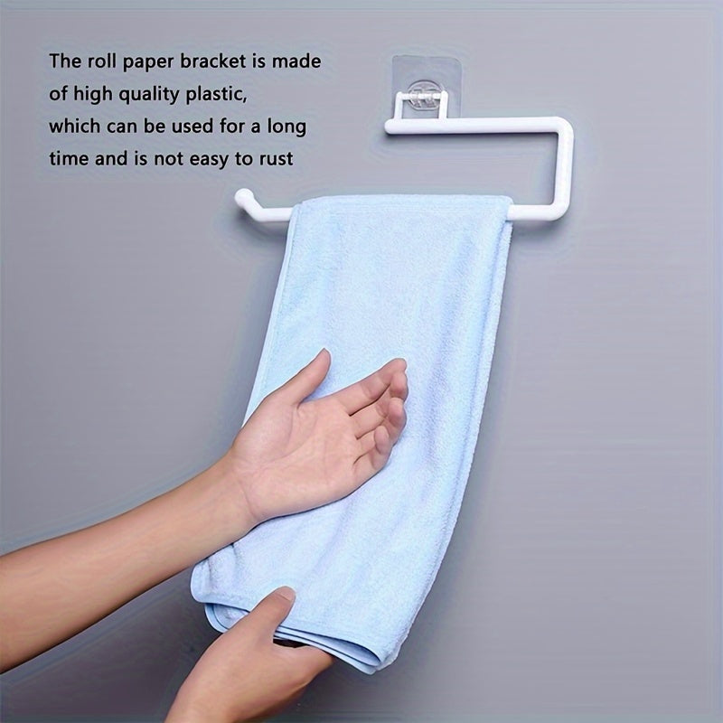 Wall mount kitchen paper towel holder made of plastic - also serves as a dispenser for toilet rolls, storage rack for cling film, and organizer for rags. This space-saving bathroom accessory is versatile and practical.