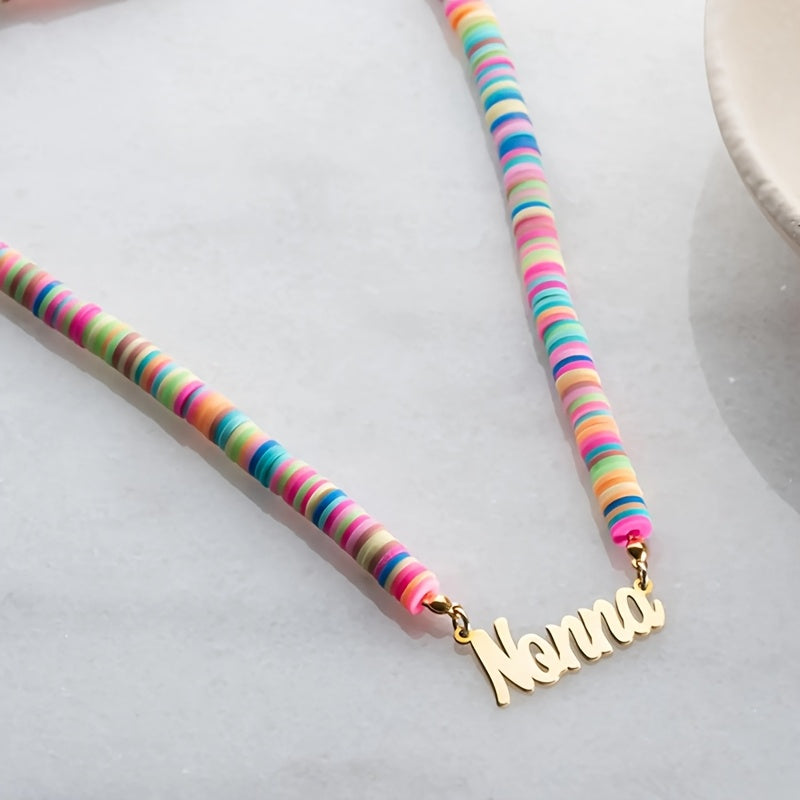 Customized Rainbow Name Necklace plated in 18K gold, featuring polymer clay beads. This accessory is both elegant and adorable, perfect for wearing all year round at any occasion. A great gift idea for Christmas and New Year's.