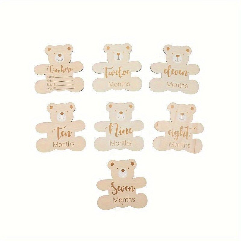 Wooden birthday lettering, growth milestone cards, sweet bear accents, wooden milestone cards, adorable photo props, baby's first birthday celebration.