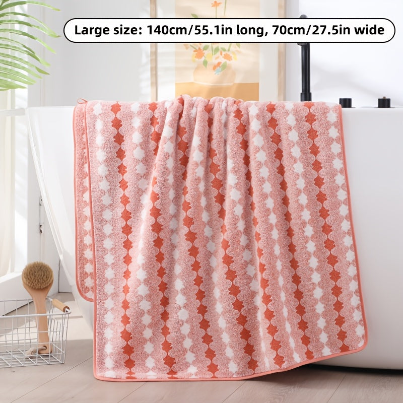 One set of extra large and small bath towels for women made of super soft, absorbent coral velvet with a modern design and strong absorbency.