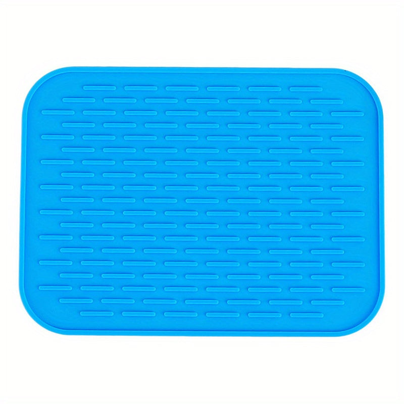 High-quality silicone drying mat for dishes, heat-resistant and non-slip, protects kitchen surfaces, versatile trivet, 21.59cm x 16.0cm, come in vibrant colors.