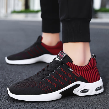 Breathable low top athletic sneakers for men with PVC sole and soft fabric upper/inner/insole, ideal for spring/fall season.