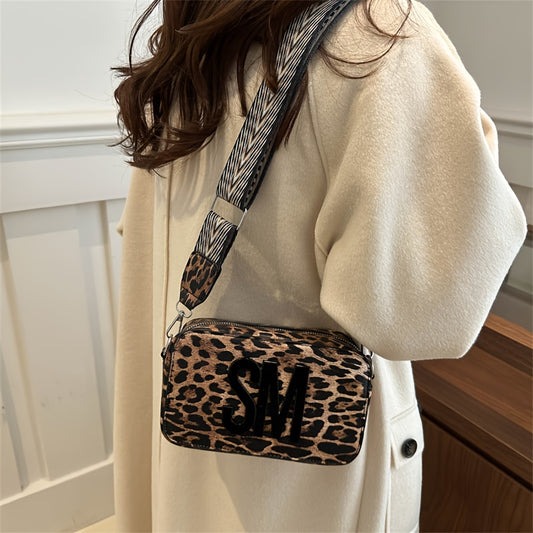 Leopard print PU crossbody bag with detachable strap in deep brown, perfect for casual or commuting outfits. Bold letter design on small shoulder bag.