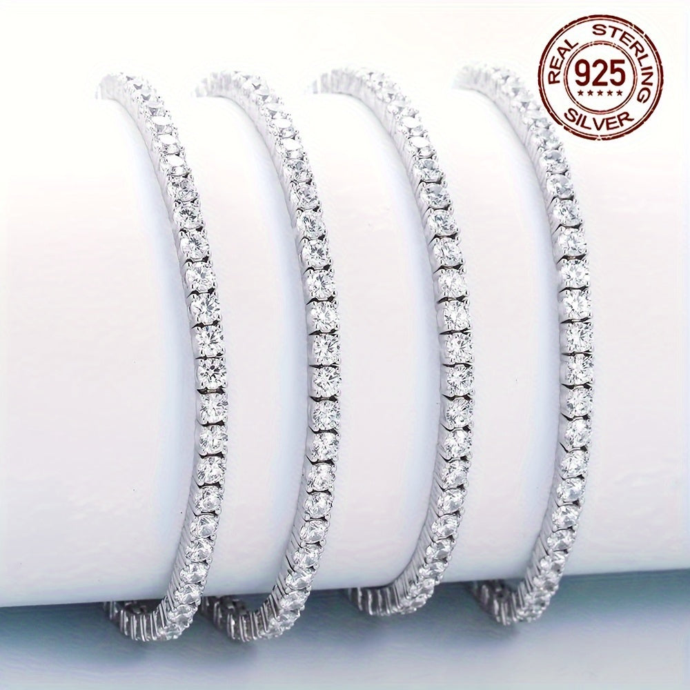 Ajoyib 925 Sterling Silver Tennis Bilaguzuk, porloq oq 3mm kubik zirkoniya toshlari bilan bezatilgan, sezgir teri uchun xavfsiz, ishonchli qisqichli yopilish xususiyatiga ega - 14-fevral, Onalar kuni, yubileylar, tug'ilgan kunlar va bayramlar uchun ideal.