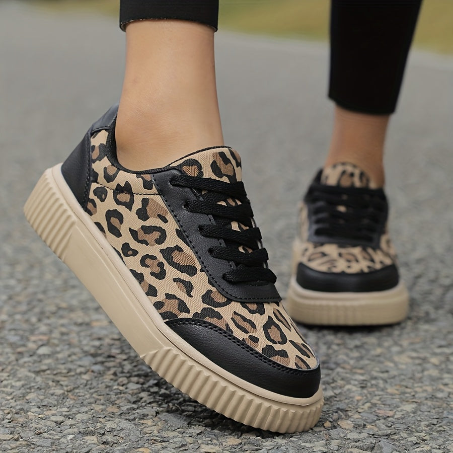 Comfortable flat casual shoes with leopard print for women, suitable for outdoor activities all year round. Made with fabric lining and insole, MD sole, lace-up closure, and regular toe