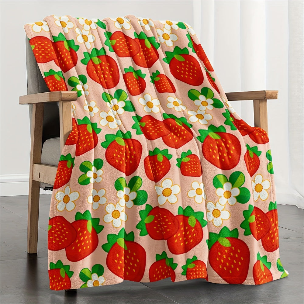 One piece of a cozy, all-season microfiber throw blanket in a rustic style, featuring a charming strawberry and flower pattern. This woven fruit-themed gift blanket is perfect for women.