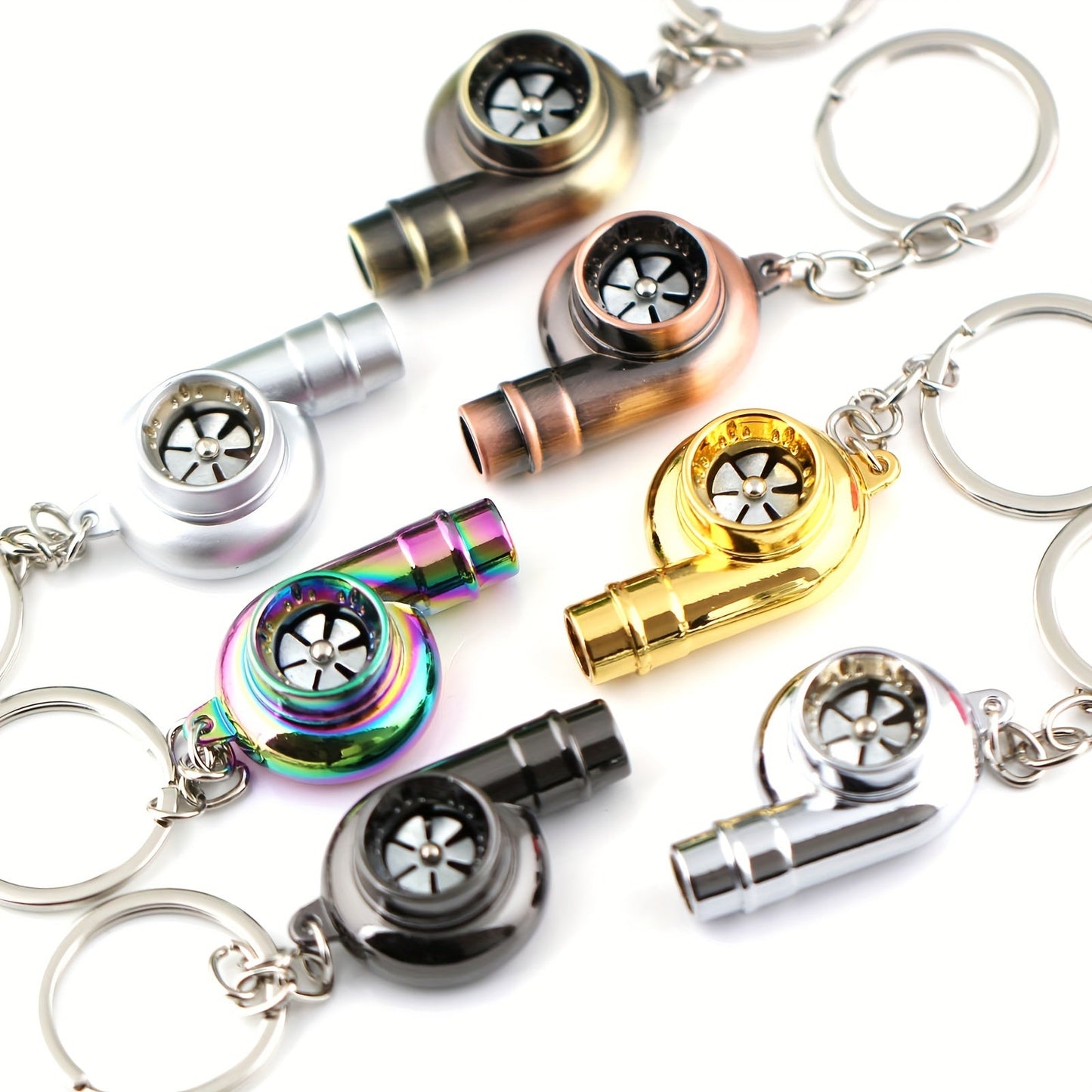 Keychain featuring a rotating turbine design, perfect for car enthusiasts. This creative accessory also doubles as a key holder and includes a turbine whistle feature. Ideal as a unique gift option.