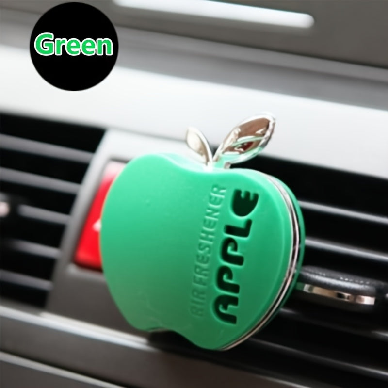 Apple-shaped car air freshener with aromatherapy perfume diffuser and vent clip fragrance dispenser. Includes balm/tablet/incense stick for portable auto scent enhancement.