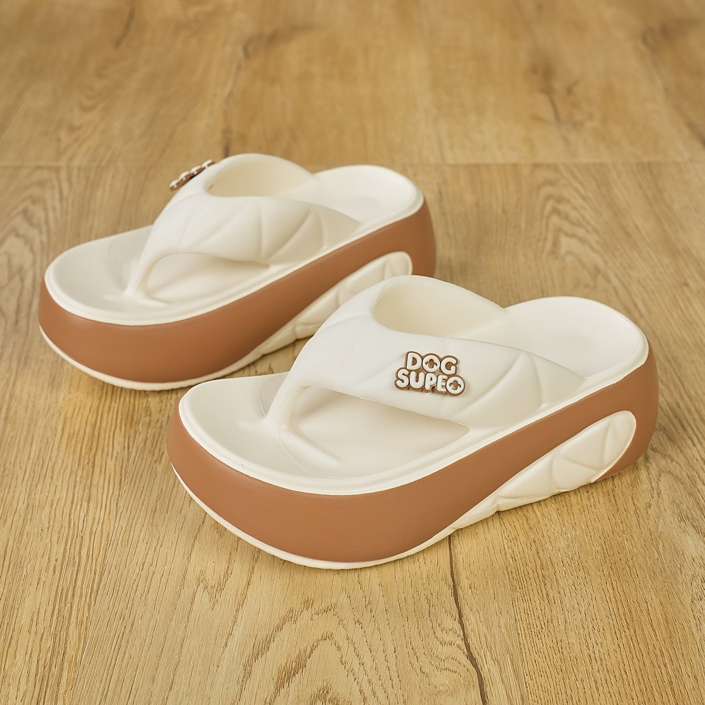 Women's stylish EVA flip-flops with arch support in cream & brown design for outdoor wear.