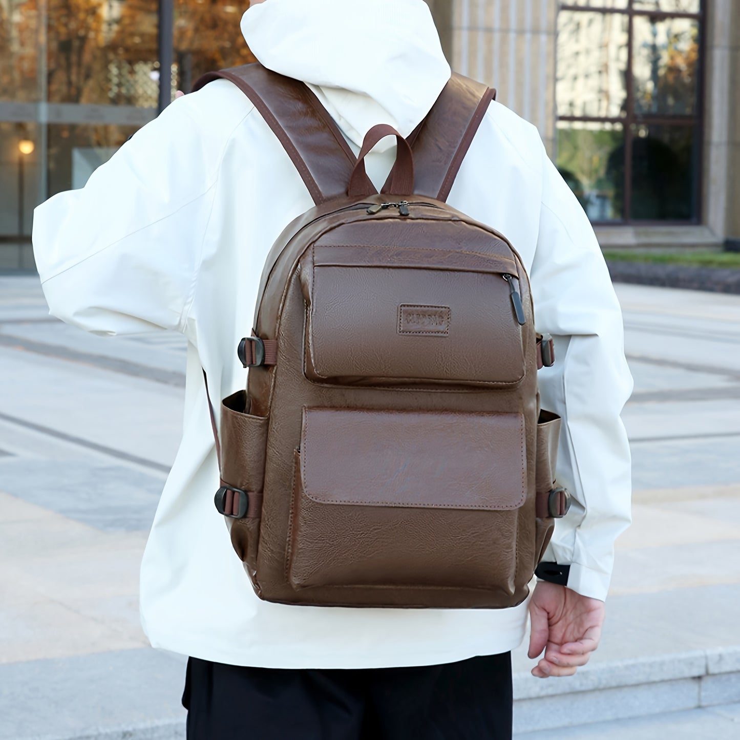 High-capacity, waterproof laptop backpack for men, suitable for business and travel.