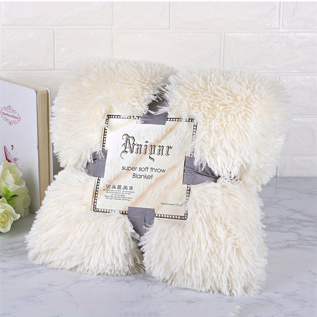 Get cozy with our Vintage Style Long-Hair Shaggy Fleece Throw Blanket. This thick and plush all-season sofa cover provides warmth and comfort in any space. Made from a woven polyester blend, this blanket is machine washable and versatile, perfect for