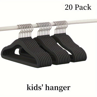 The HOUCOC 20-piece Velvet Hangers Set is Perfect for Organizing Kids' Clothing in the Closet - Non-Slip and Space-Saving Solution for Pants, Shirts, and Dresses for Children and Teens.