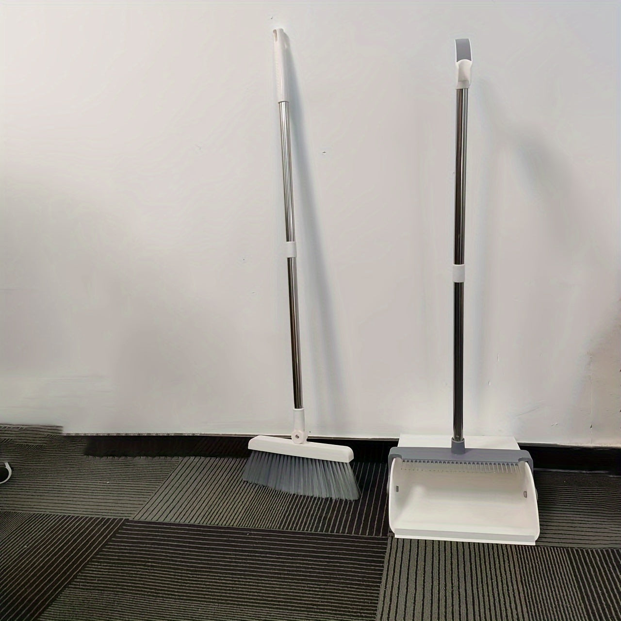 The Multi-Angle Folding Broom and Dustpan Set is equipped with a telescopic handle and comb teeth, making it perfect for cleaning living rooms, bedrooms, kitchens, and floors.