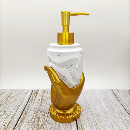 Elegant gold fingerprint resin soap dispenser, mercury-free with textured design. Ideal for bathroom and kitchen decor. Made of resin.