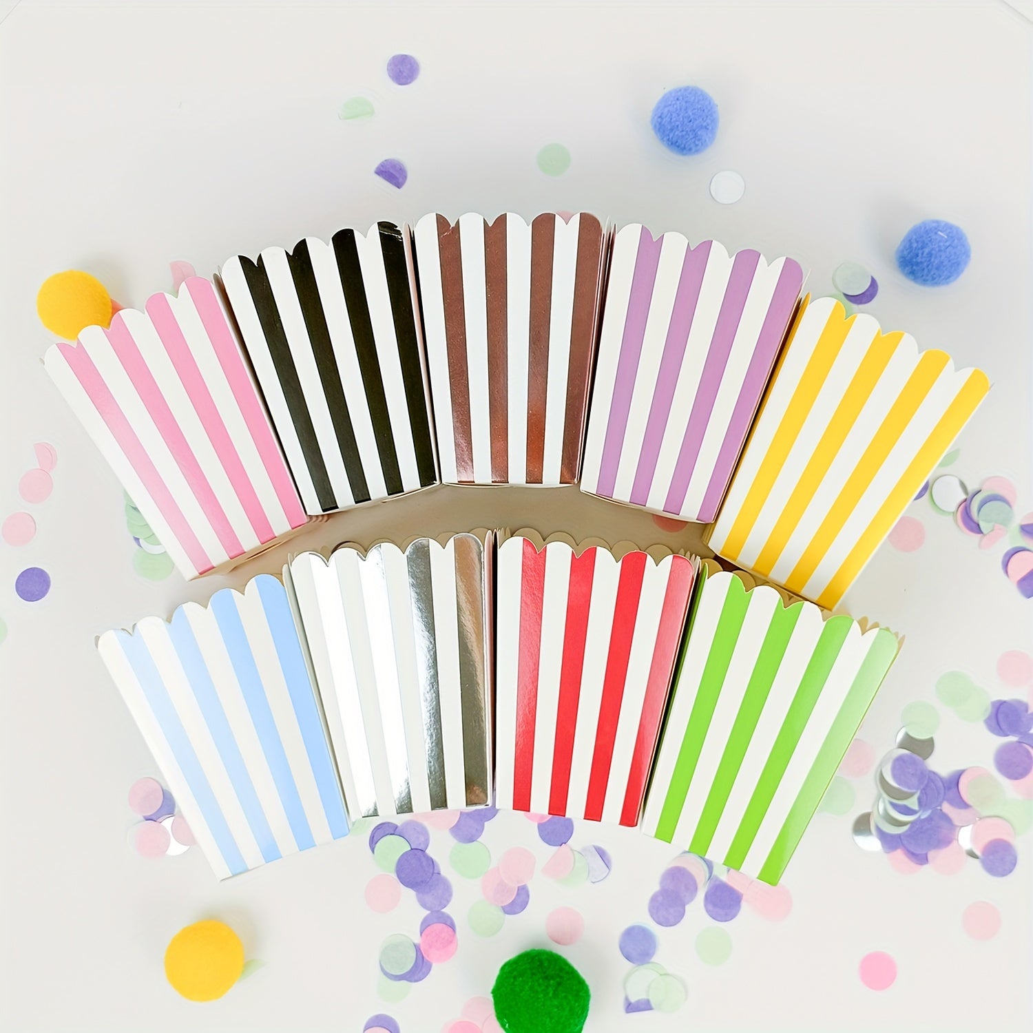 Paper popcorn boxes with stripes, perfect for birthday parties, picnics, or any special occasions. Comes in a set of 12 disposable boxes perfect for candy or snacks.