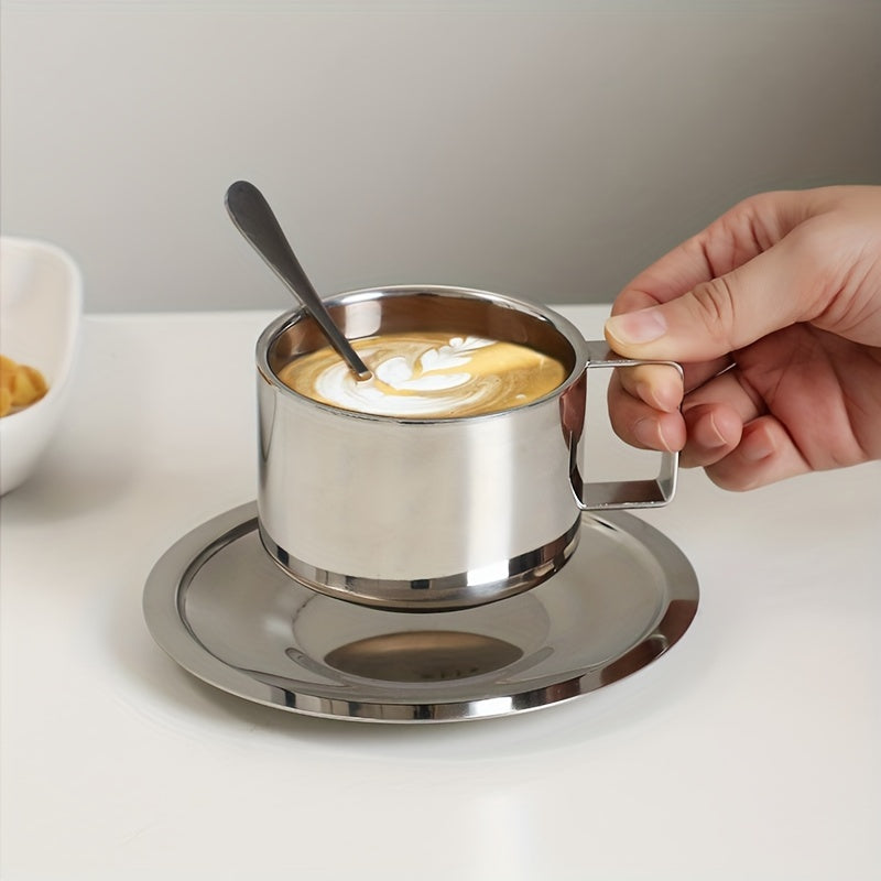 Stainless steel coffee cup and saucer set suitable for home or office, perfect for cappuccinos, lattes, mochas, and tea.