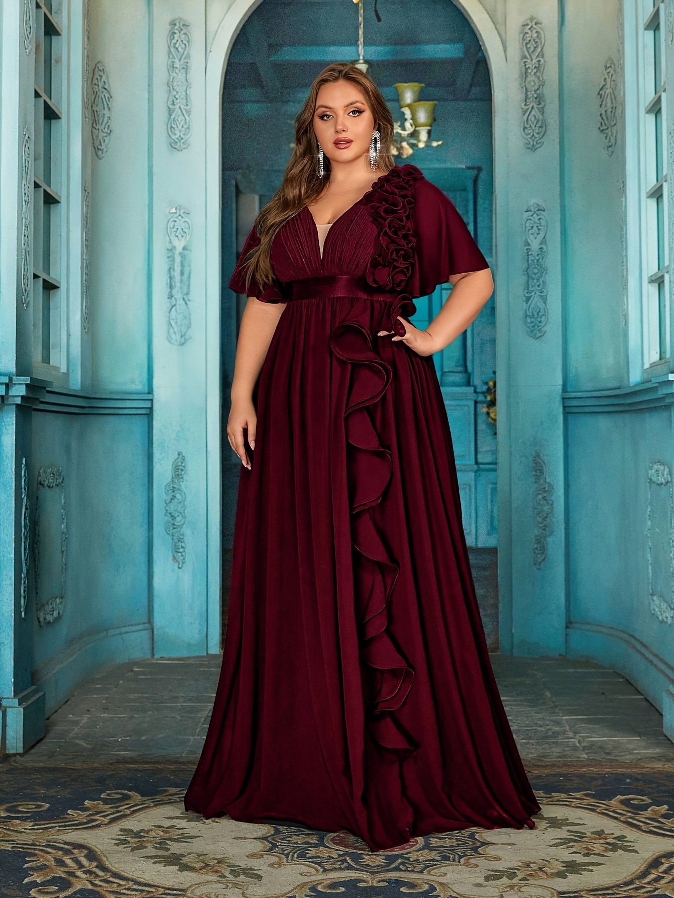 Stylish Plus Size Black Chiffon Evening Gown with V-Neck, 3D Floral Detail, Ruffled Hem, Short Sleeves, and High Waist. Perfect for weddings, graduations, and formal occasions.