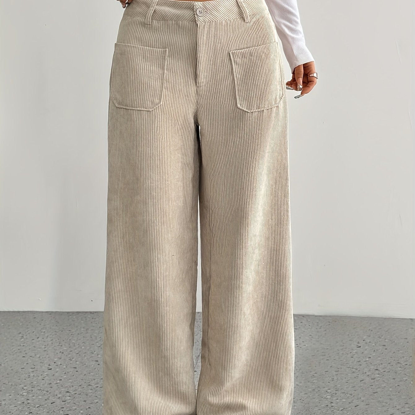 Casual corduroy wide leg pants for women made of polyester, suitable for all seasons.