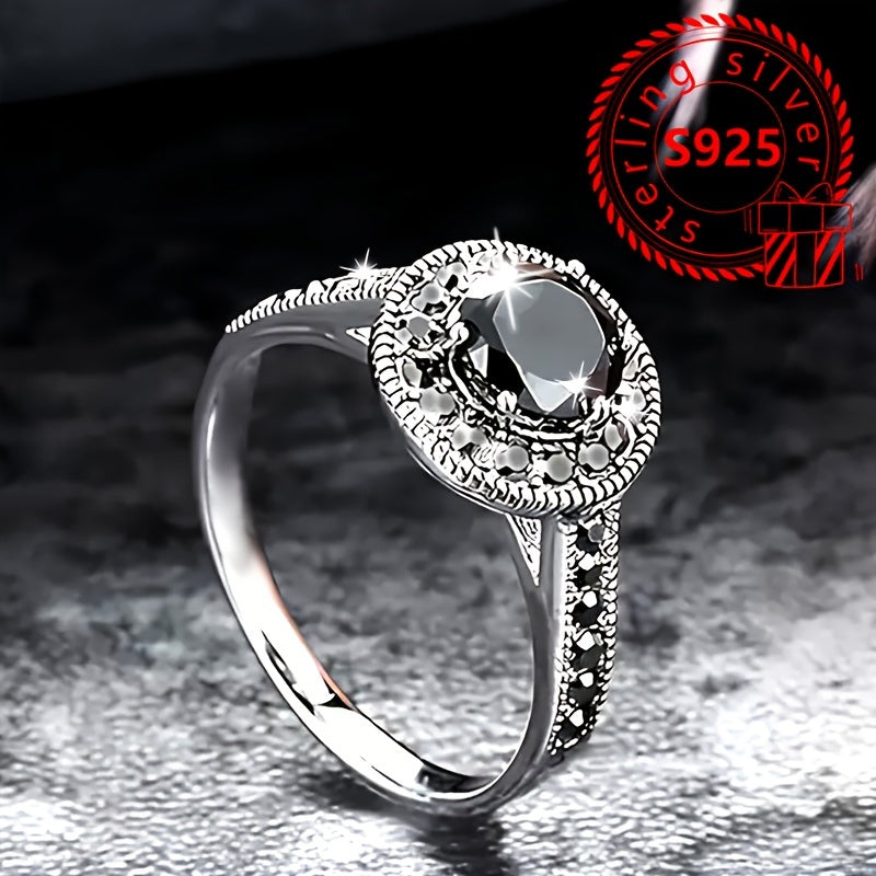 This stunning 925 sterling silver ring features a vintage-inspired design with a black cubic zirconia stone. Perfect for both casual wear and gifting, this ring comes with a gift box and weighs 2.9g. Ideal for ladies who appreciate timeless elegance.