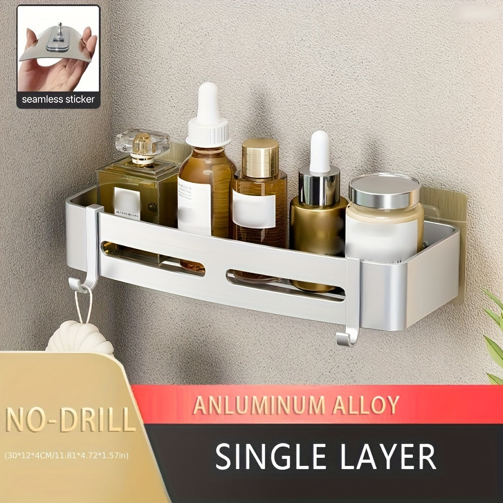 Wall-mounted bathroom storage rack for shampoo, shower gel, and cosmetics; made of space aluminum with no need for drilling.