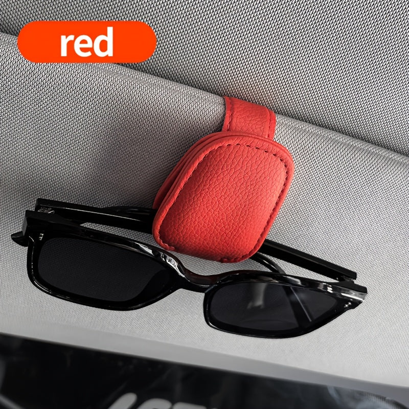 Universal car sun visor clip made of PVC material for storing eyeglasses in the vehicle interior.