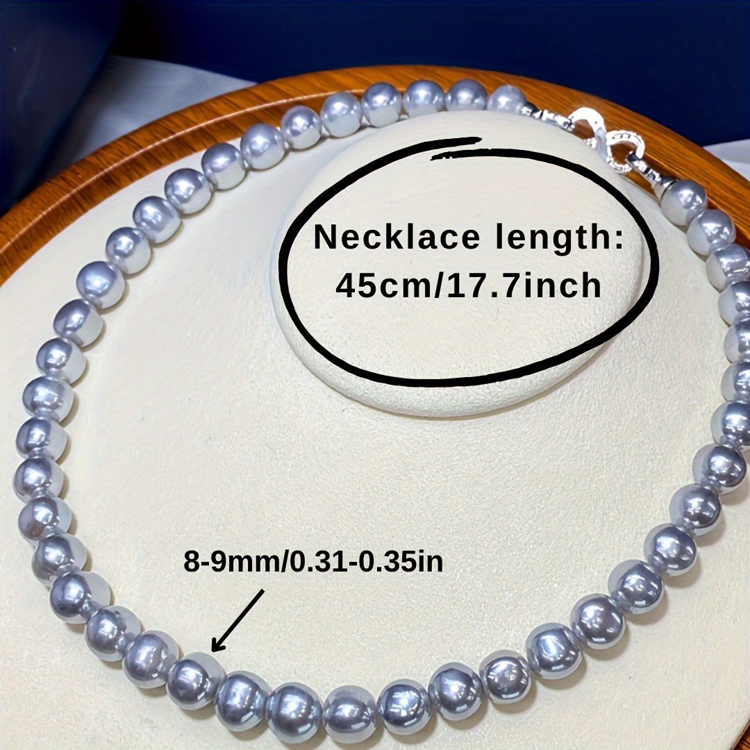 This elegant grey freshwater pearl necklace is luxurious, fine, and delicate. Perfect for wives, mothers, and girlfriends, it is ideal for formal events and special celebrations. Presented in a gift box, this classic style piece is suitable for