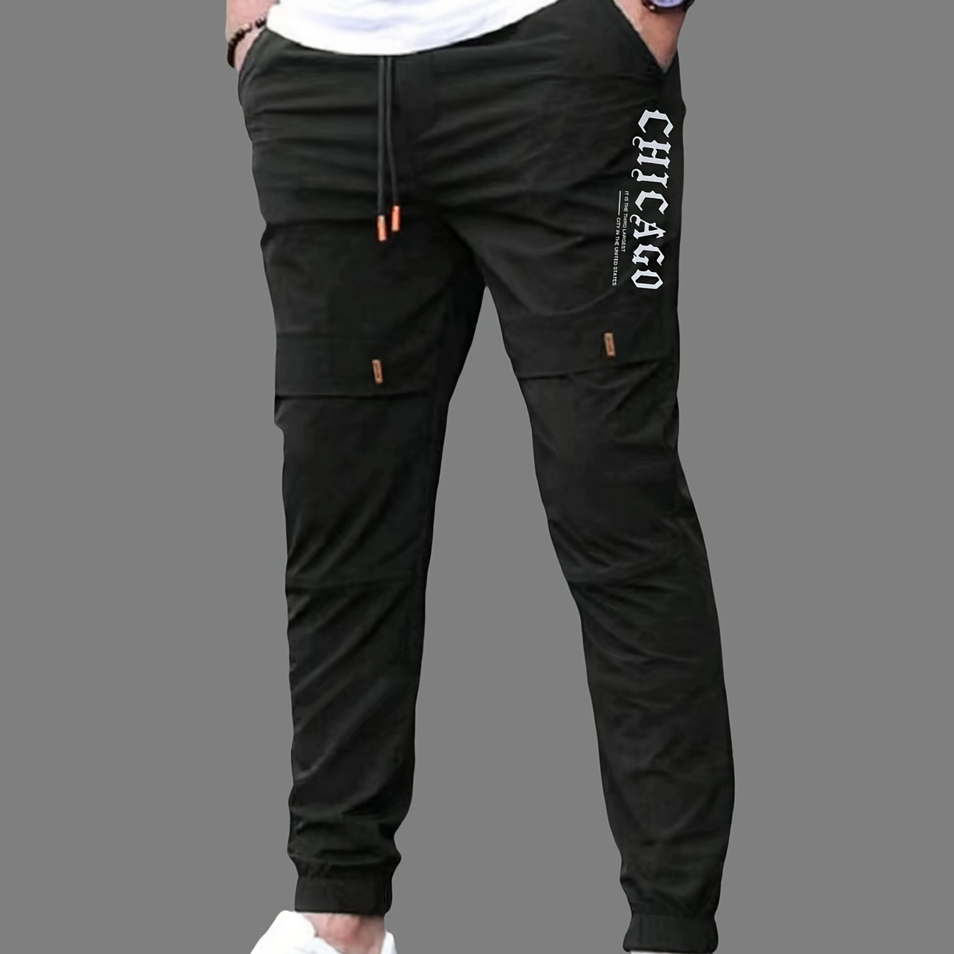 Men's casual joggers made of 100% polyester non-stretch woven fabric with alphabet print detail, suitable for all seasons and featuring a regular fit.