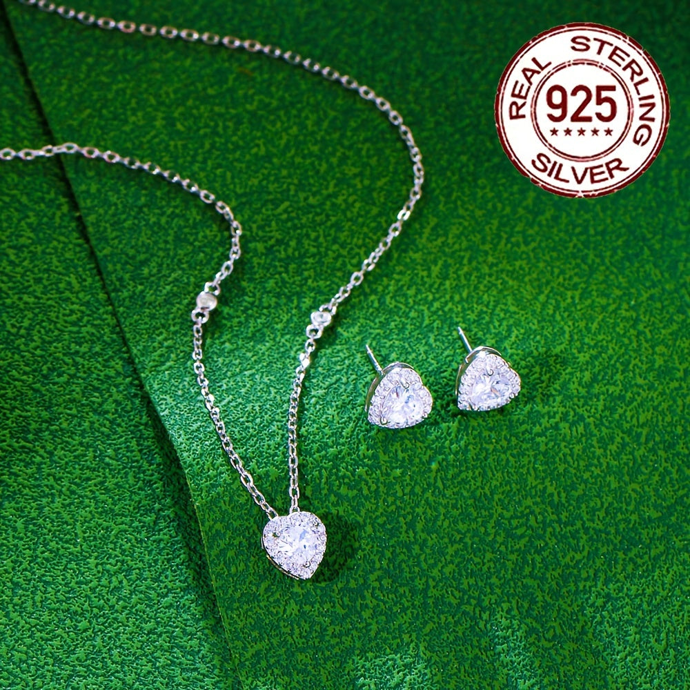 An Elegant Jewelry Set for Women, adorned with a Romantic Heart Design crafted from 925 Sterling Silver, weighing 5.7g/0.201oz. This stunning set features low allergenic properties and is embellished with sparkling White Cubic Zirconia in a Three-Prong